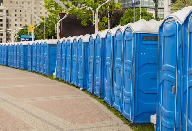 a row of portable restrooms at a fairground, offering visitors a clean and hassle-free experience in magnolia